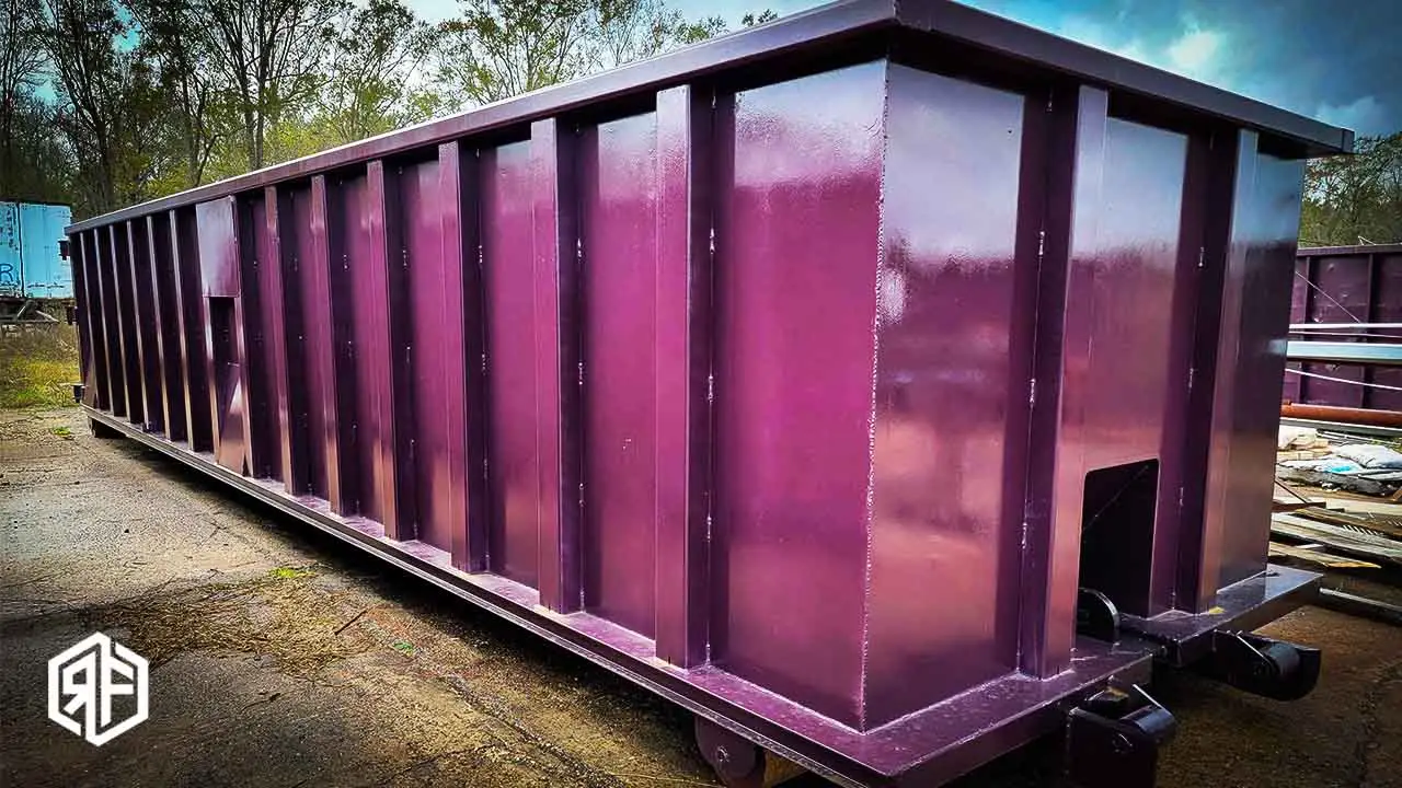 purple roll off dumpster from refuse fab in st gabriel