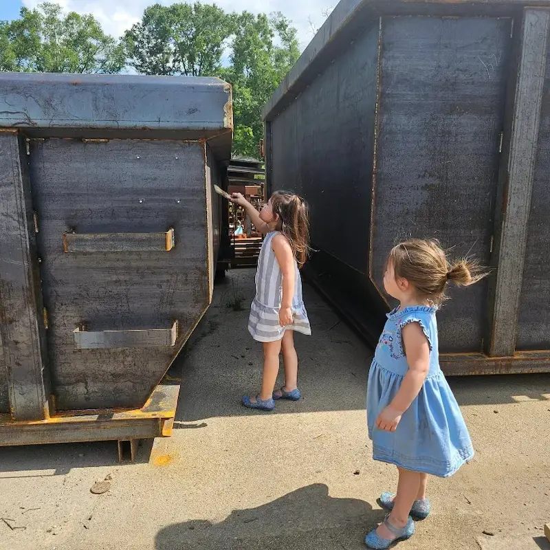 marley and ellie painting roll off container